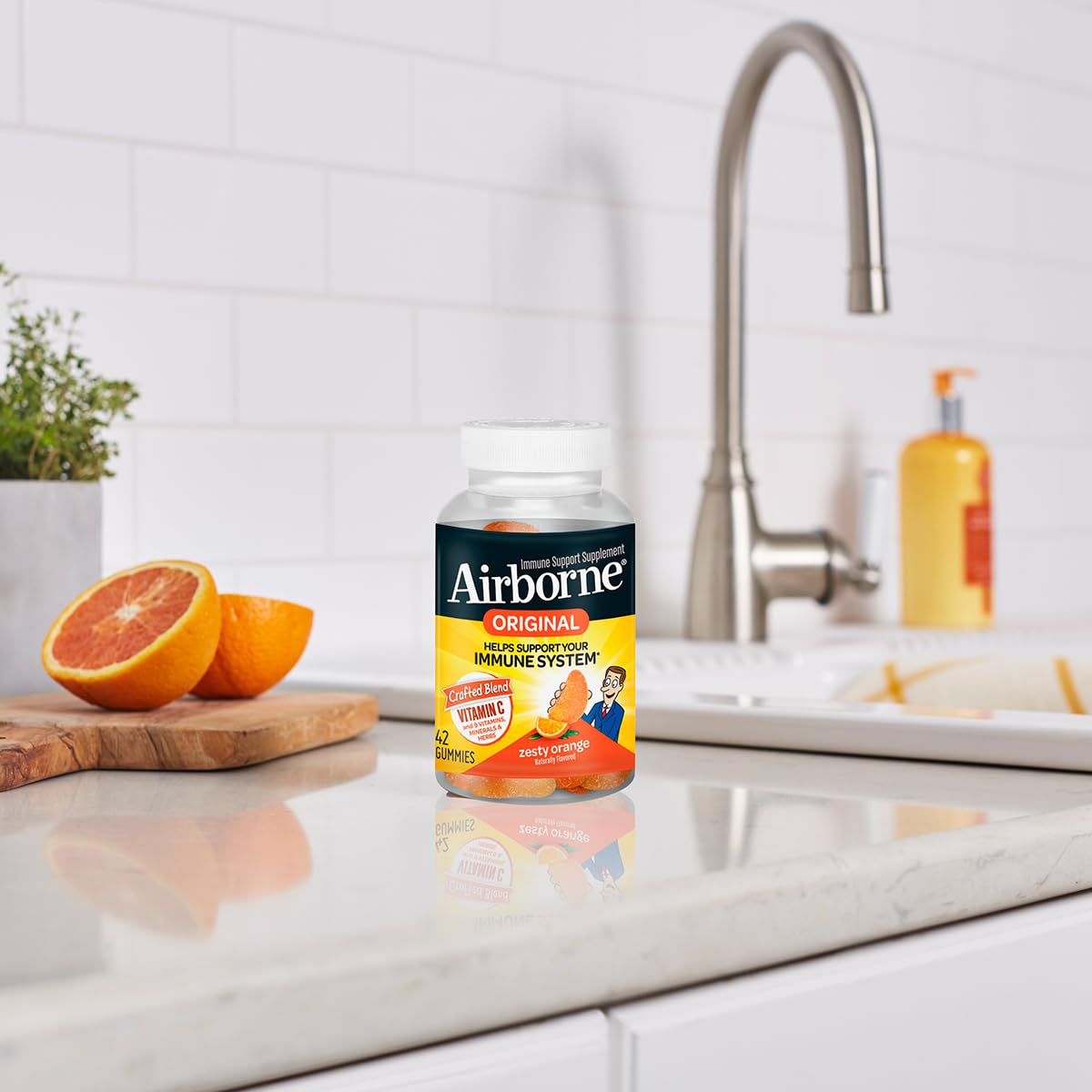 Airborne 750mg Vitamin C Immune Support Supplement Gummies for Adults, Zesty Orange Flavor, Gluten Free Crafted Blend with Powerful Antioxidants Vitamins C & E, 42 Gummies (2 Pack)